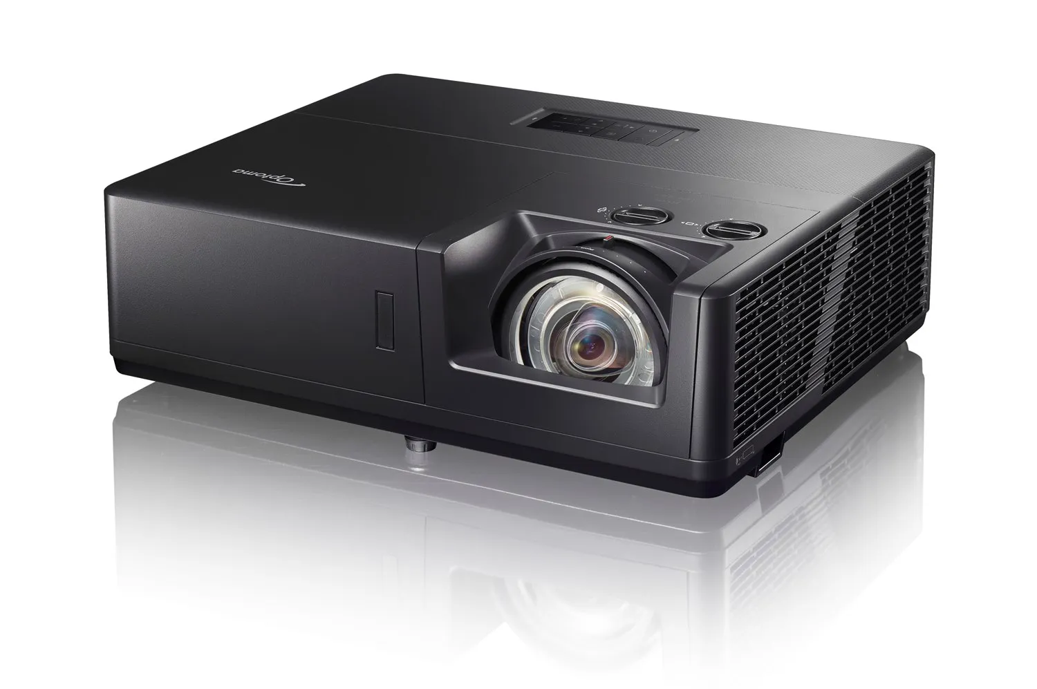 Dieses Bild zeigt den Projektor Optoma ZU607TST. Die Kamera zeigt den Projektor von oben rechts.