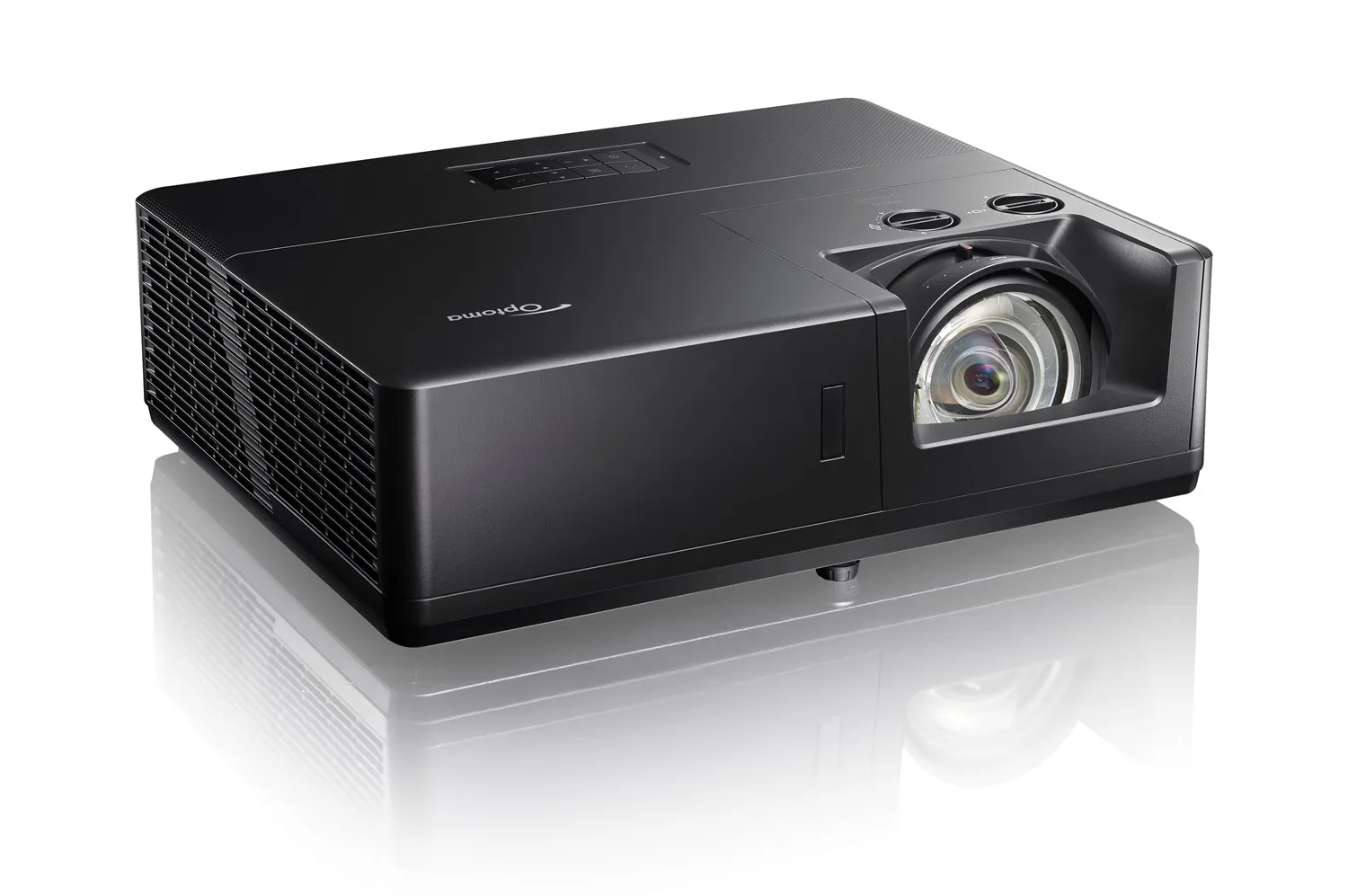 Dieses Bild zeigt den Projektor Optoma ZU607TST. Die Kamera zeigt den Projektor von oben links.